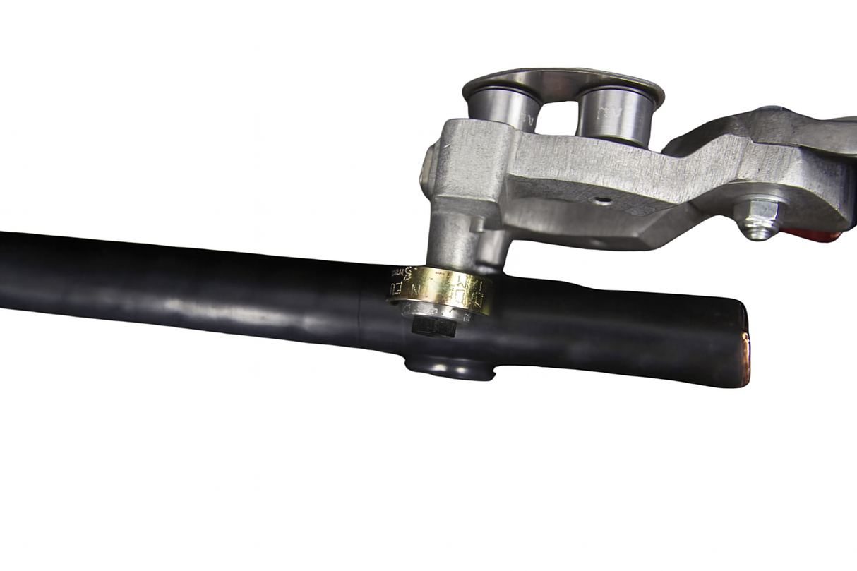 Adjustable depth outer jacket stripping pliers in use on a cable, showcasing dual-cut functionality for precise stripping.