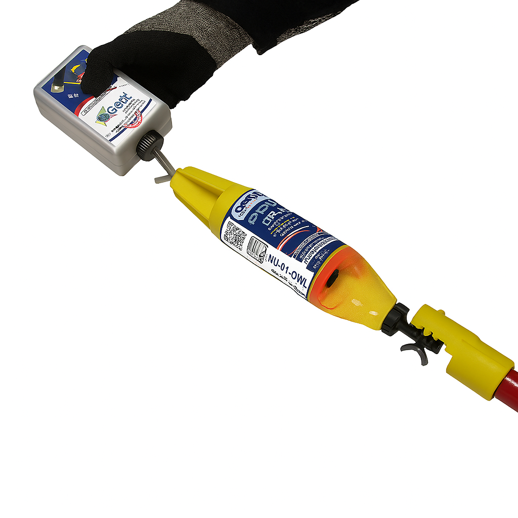 Capacitive voltage detector testing unit held by a gloved hand, featuring a battery-powered design for safety.