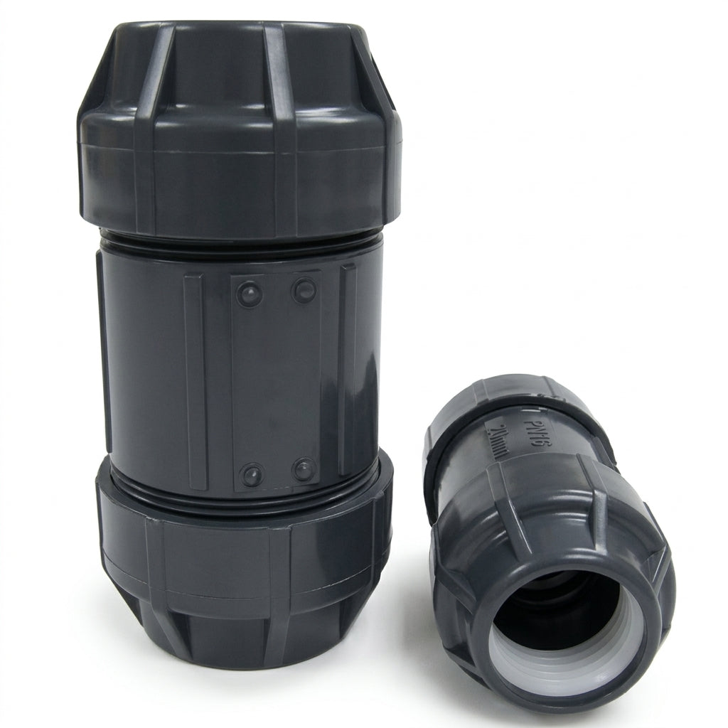 Two gray ETCO Double E-Loc compression couplings, one standing upright and one on its side showing the open end and lock ring