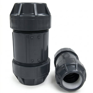 Two gray ETCO Double E-Loc compression couplings, one standing upright and one on its side showing the open end and lock ring