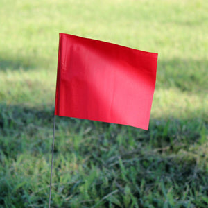 Red marking flag on a wire stake, ideal for utility, landscaping, and surveying applications. Solid and custom options available.