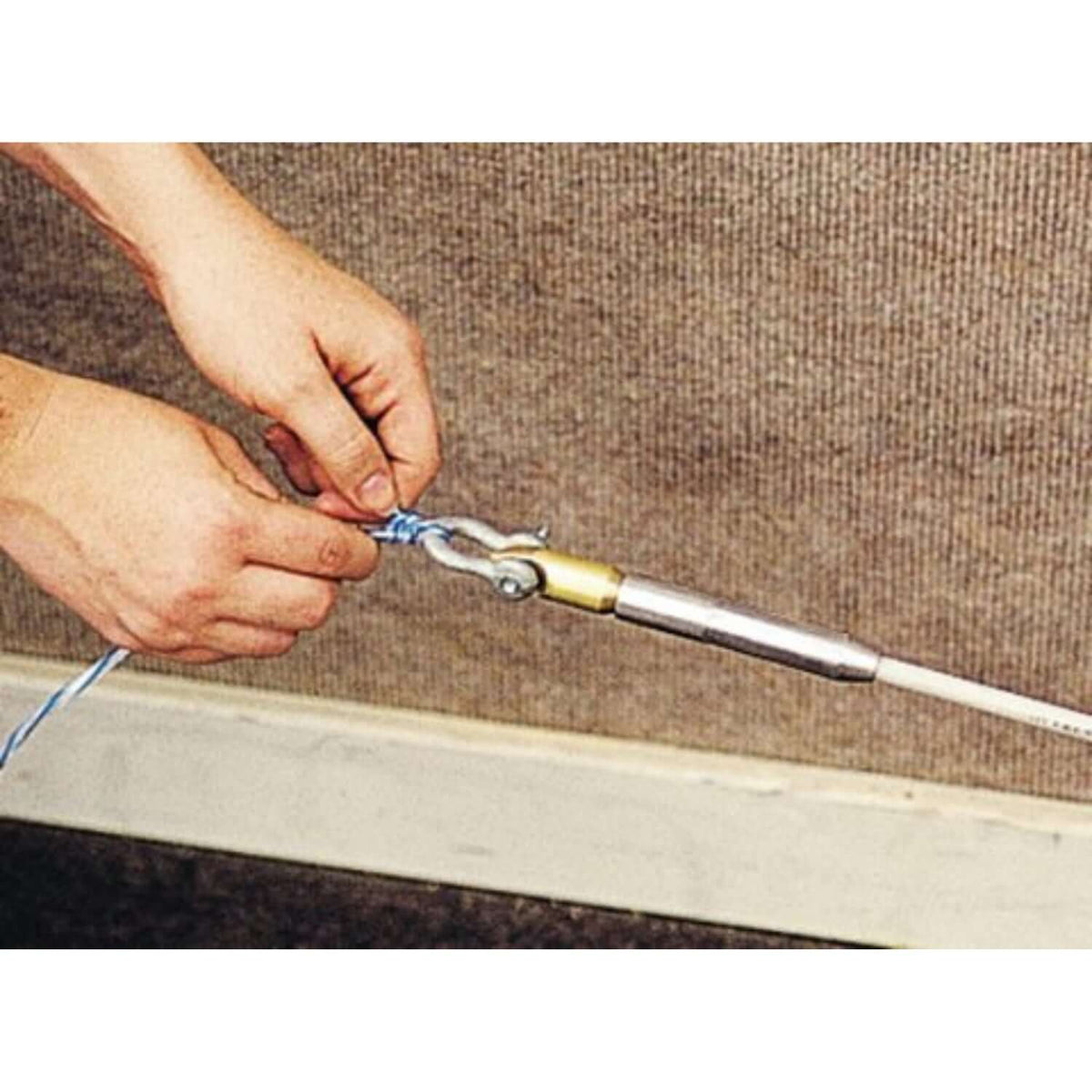 Attaching a pull line to the end fitting of a Condux duct rodder