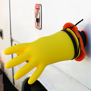 Penta EOSXMO Portable Glove Inflator with Magnet – shown in use inflating a yellow insulating glove during safety inspection.