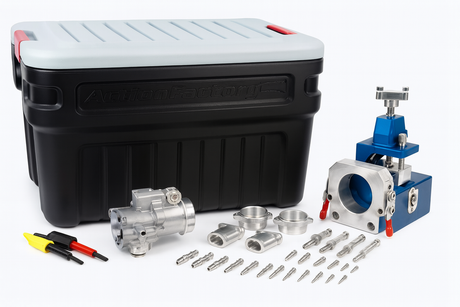 Fiber optic cable mini-blower/pusher with accessories, including connectors and tools, in a storage container.